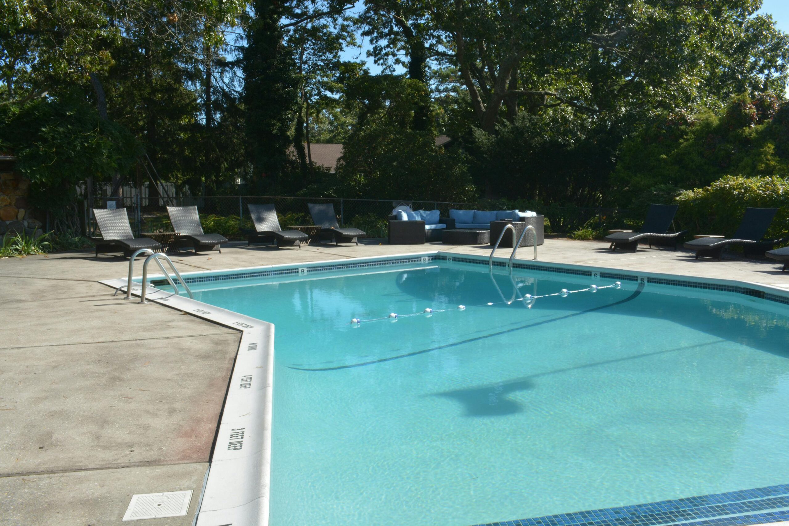 Sunset Haven Discover relaxation at this luxurious outdoor poolside retreat in Hampton Bays, NY.